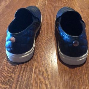 Black Steve Madden Quilted Slip On’s